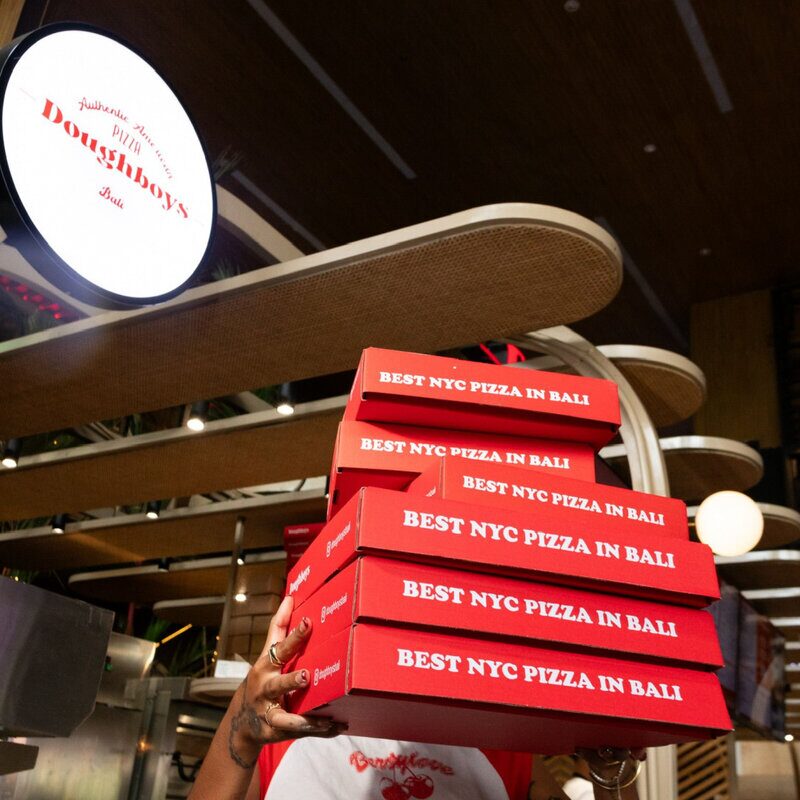 Fresh pizza slice at Doughboys best NYC-style pizza in Bali